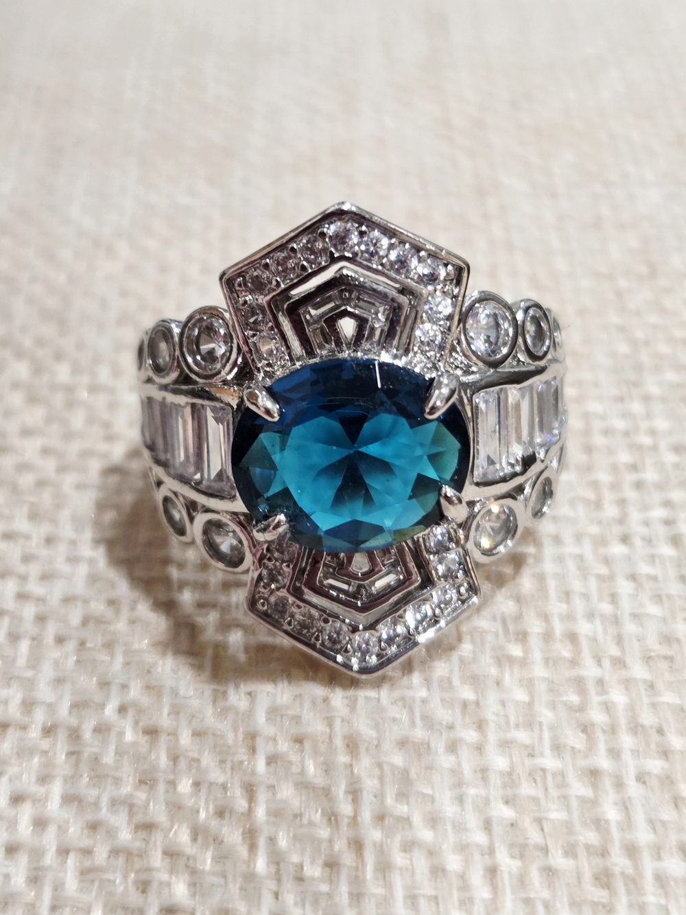Silver Tone Ring with Teal Blue Center Stone and Clear Accents~size 9.5